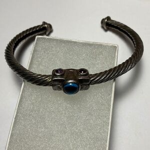 Sterling Silver Open Cable Cuff Bracelet with Blue Topaz Stones. 2 3/8” across